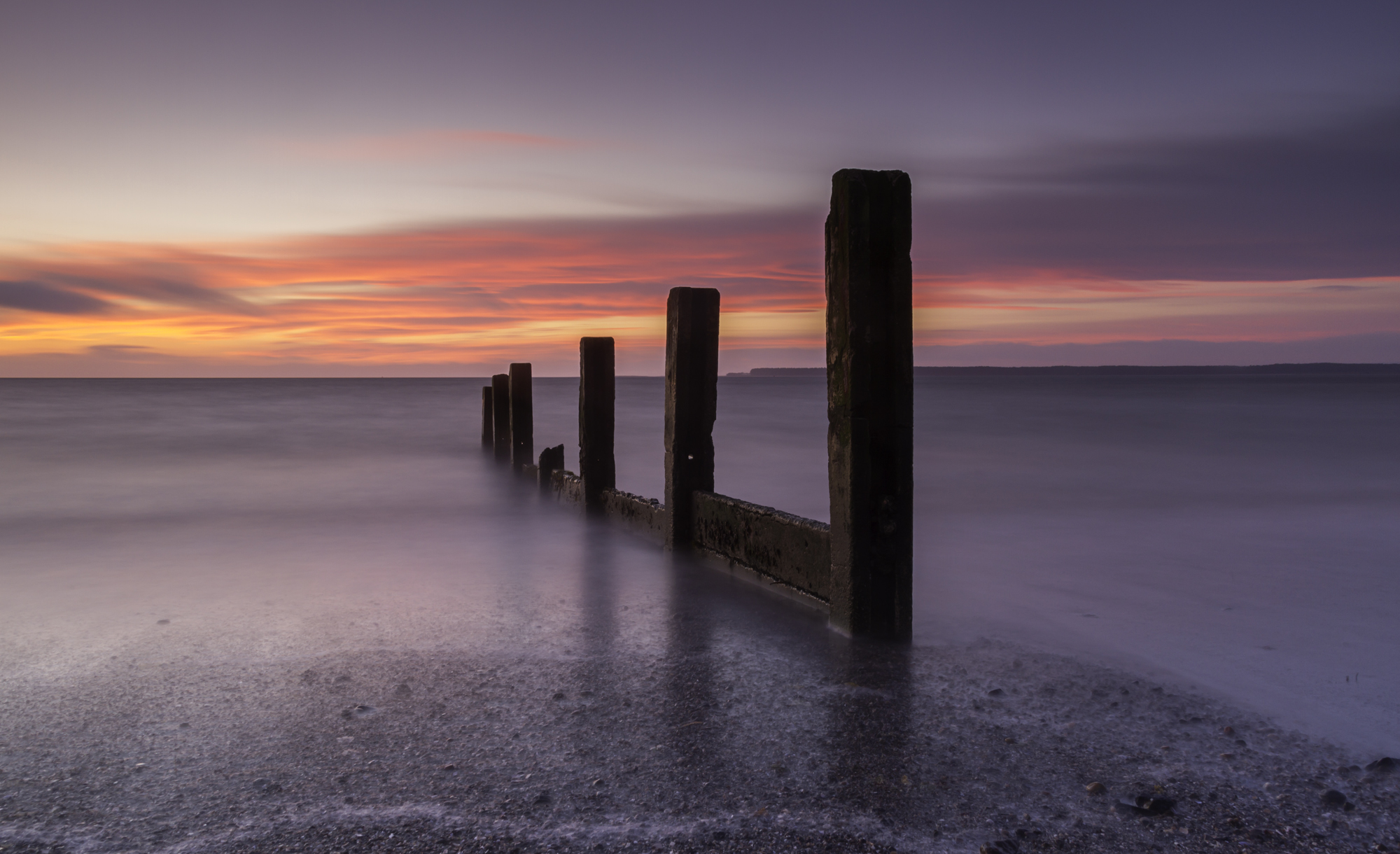 Landscape image taken of Monfeith beach at sunrise